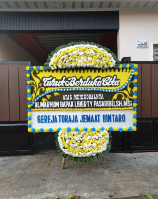 Papan Bunga Duka di Teladan Barat